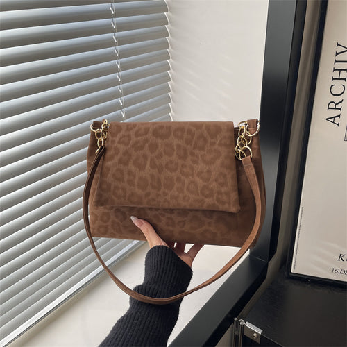 Damen Umhängetasche mit strukturiertem Wildleder und elegantem Kettenakzent Nord Taschen