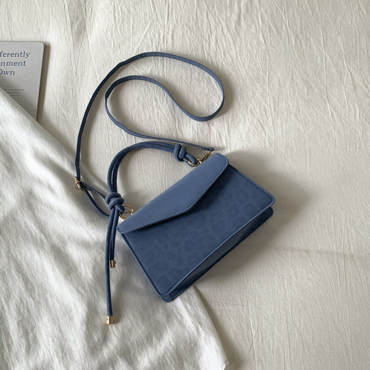 Damen Umhängetasche mit eleganter Leo-Prägung und abnehmbarem Schulterriemen Nord Taschen