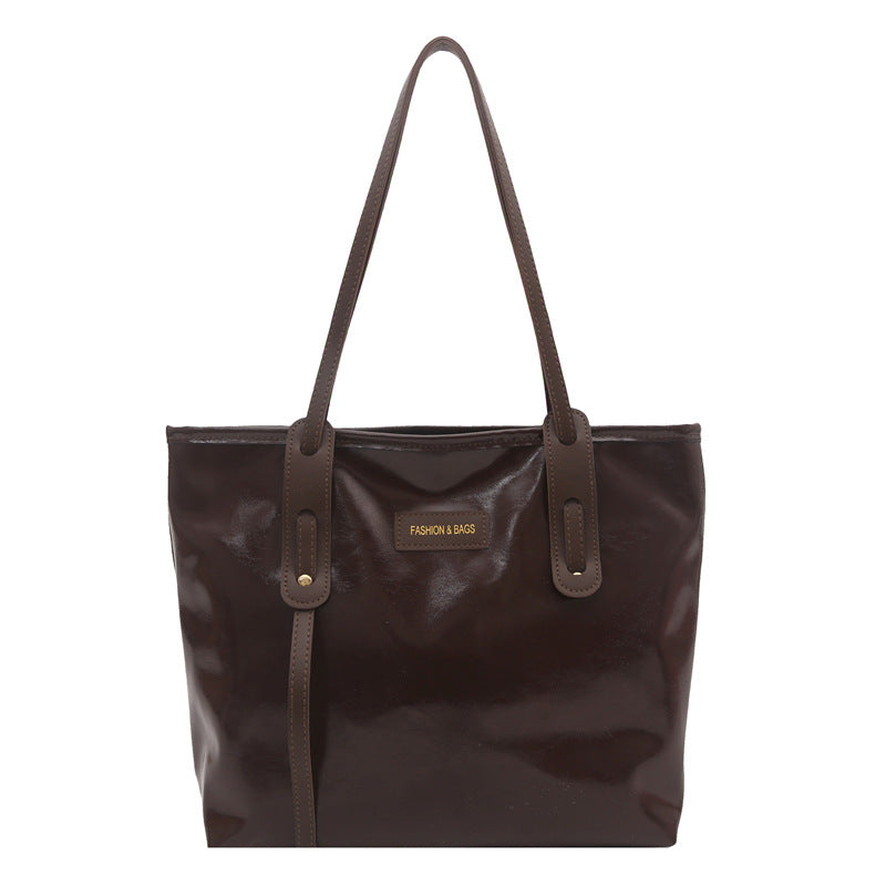 Damen elegante Ledereinkaufstasche mit schimmerndem Finish und abnehmbaren Schulterriemen Nord Taschen