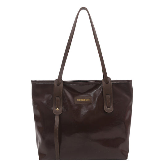 Damen elegante Ledereinkaufstasche mit schimmerndem Finish und abnehmbaren Schulterriemen Nord Taschen