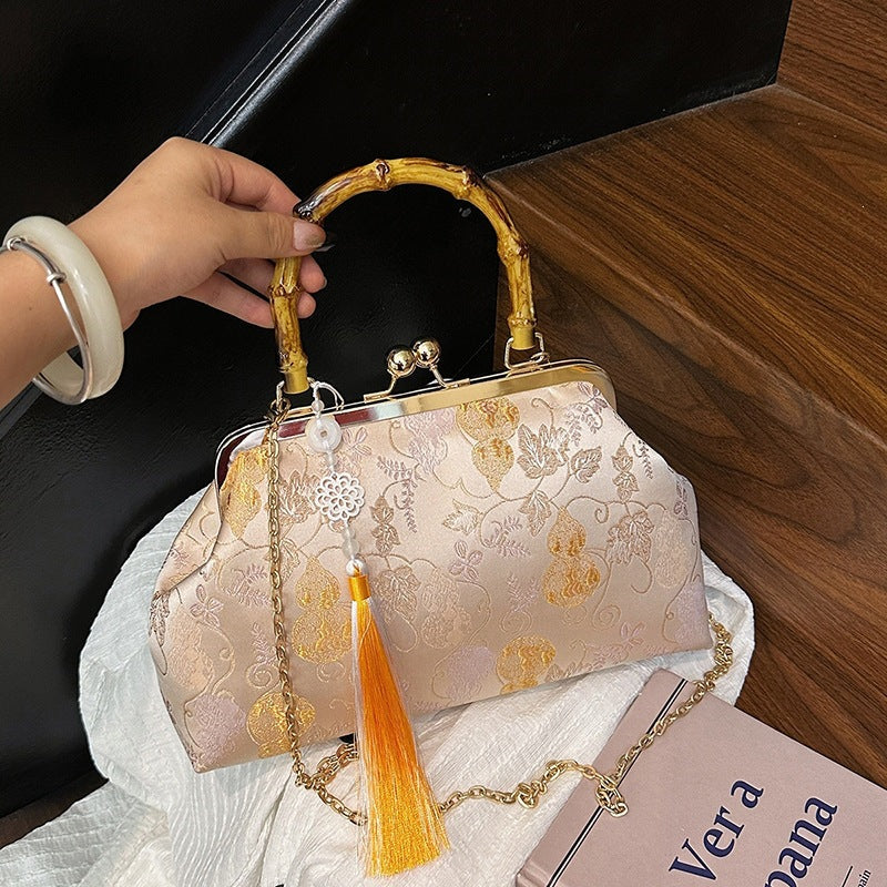 Damen elegante Handtasche mit Bambusgriffen und floralem Design Nord Taschen