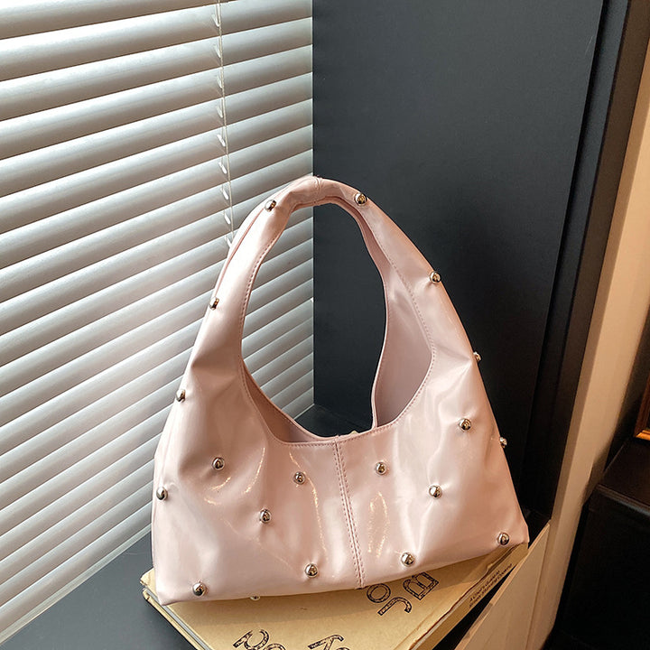 Damen glänzende Handtasche mit strukturiertem Design Nord Taschen
