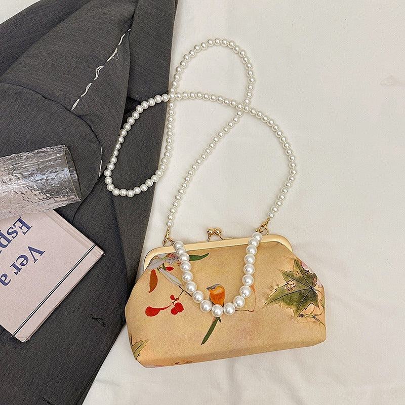 Damen elegante Handtasche mit zartem Blumendruck und Perlenkette Nord Taschen