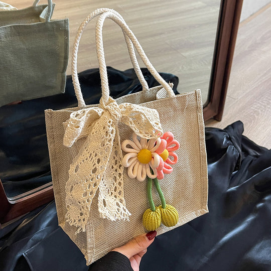 Damen praktische Jute-Tragetasche mit floralem Dekor und verspieltem Schleifenakzent Nord Taschen