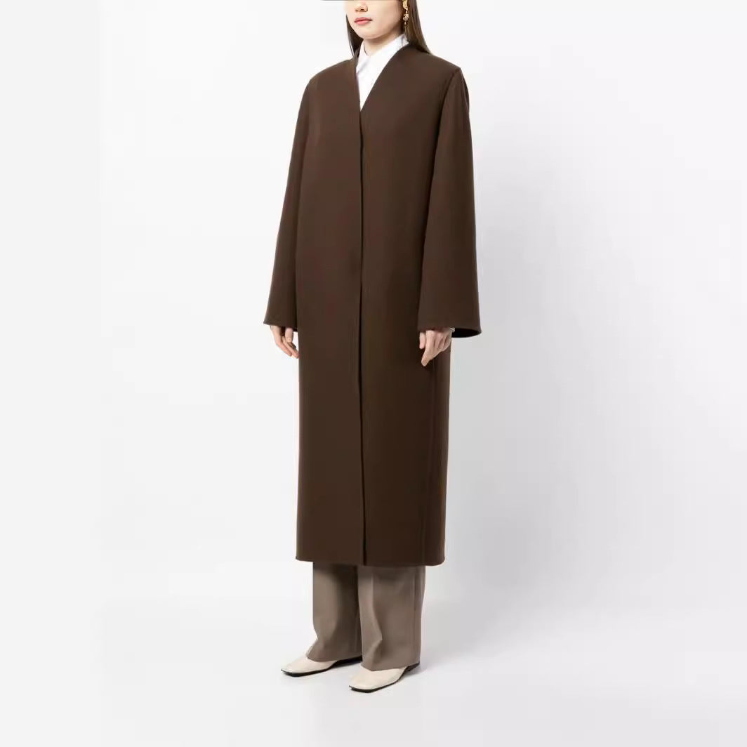 Damen Maxilanger minimalistischer Mantel mit verdeckter Front und kastiger Schulter Nord Taschen