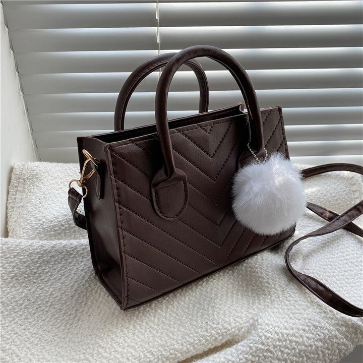 Damen elegante Handtasche im strukturierten Chevron-Design Nord Taschen