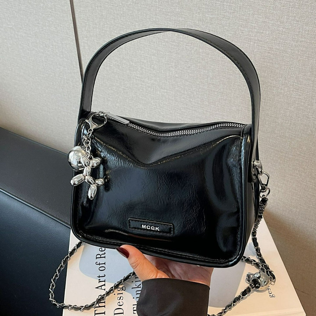 Damen Schultertasche mit glänzendem Metalliceffekt Nord Taschen
