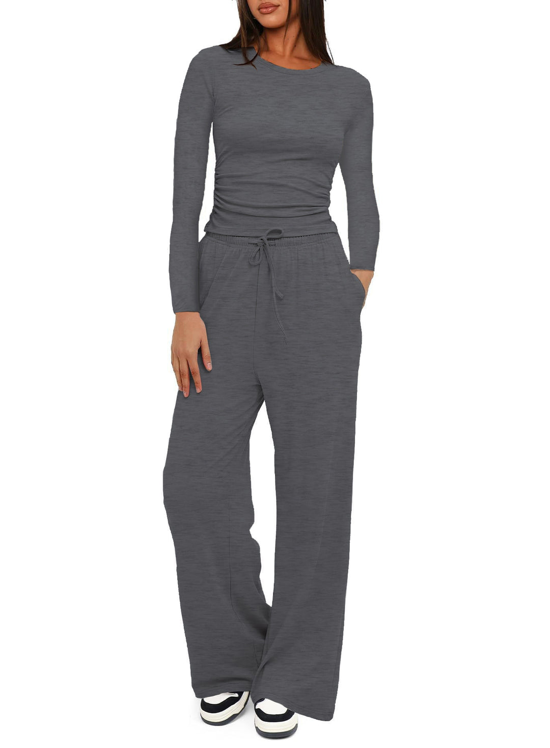 Damen Figurnahe Langarmshirt mit seitlicher Raffung und weiter Tunnelzug-Jogginghose Nord Taschen