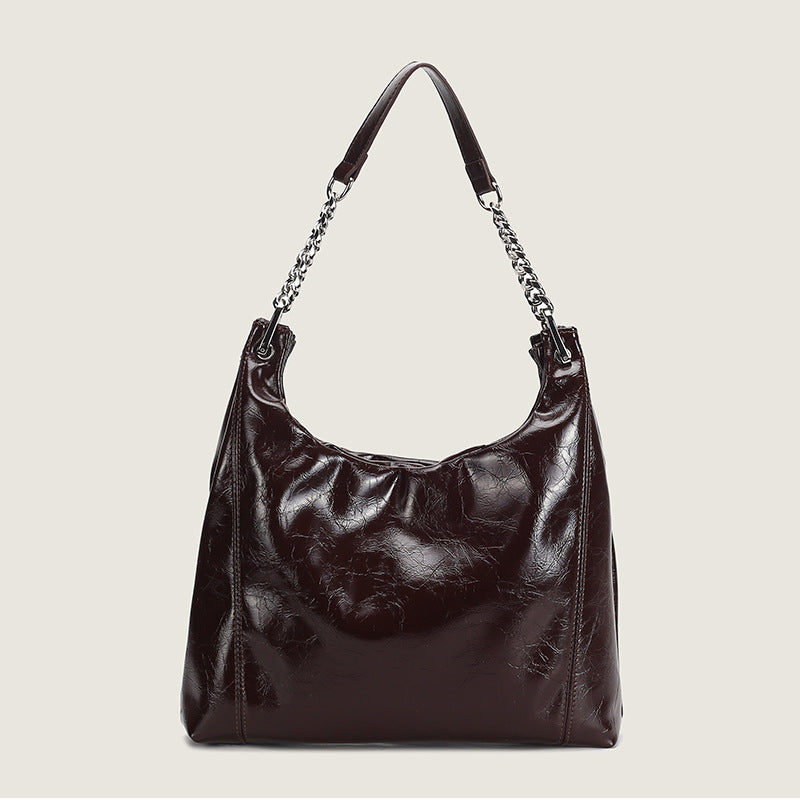 Damen Hobo-Tasche aus glänzendem Kunstleder mit luxuriösen Kettenakzenten Nord Taschen