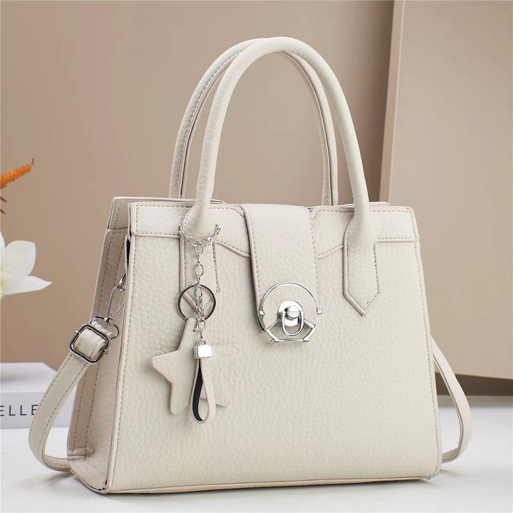 Damen elegante Handtasche mit modischem Anhänger Nord Taschen