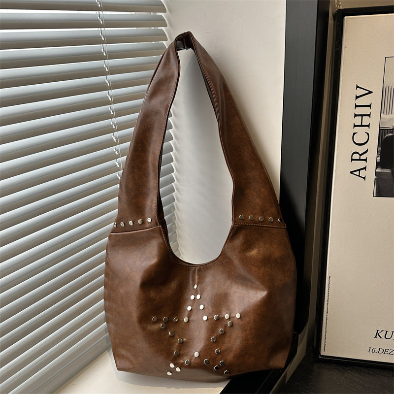 Damen Hobo-Tasche mit eleganter Sternenverzierung und strukturiertem Kunstleder Nord Taschen