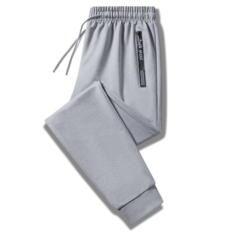 Herren Sportliche Trainingshose mit elastischem Tunnelzugbund, Reißverschlusstasche und glattem Performance‑Material Nord Taschen