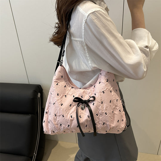Damen modische Schultertasche mit schimmernder Oberfläche und dekorativen Details Nord Taschen