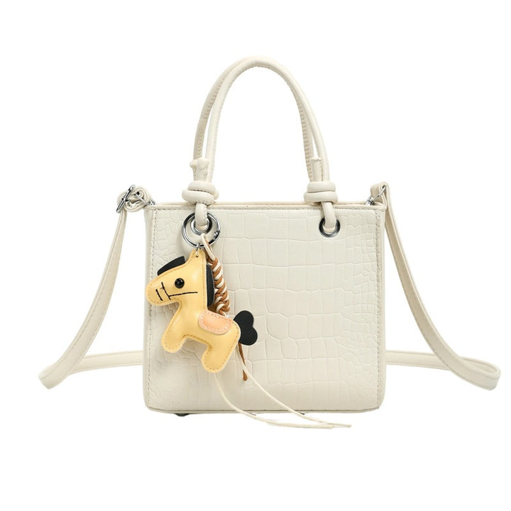 Damen Mini-Tasche mit tierischem Anhänger und modernem Krokodil-Look Nord Taschen