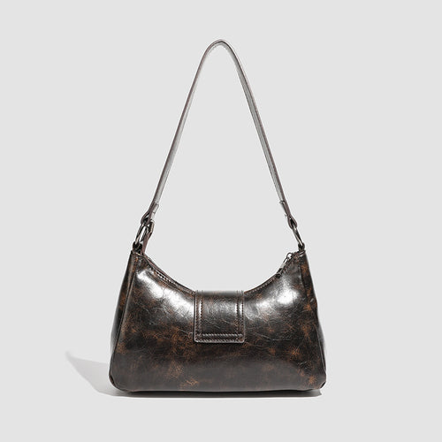 Damen Hobo-Tasche mit eleganter Faltenstruktur und glänzendem Buckle-Detail Nord Taschen