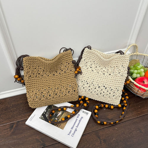 Damenhandtasche aus handgewebtem Naturmaterial mit verspielten Details Nord Taschen