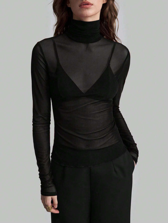 Damen Transparente Turtleneck-Bluse mit figurformendem Schnitt Arvani