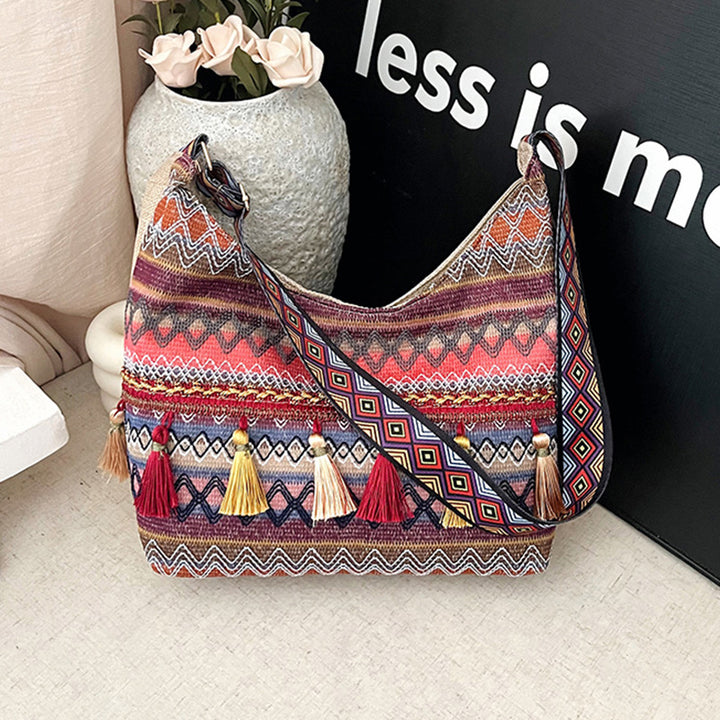 Damen Umhängetasche mit kunstvollem Ethnodesign und lebhaften Quasten Nord Taschen