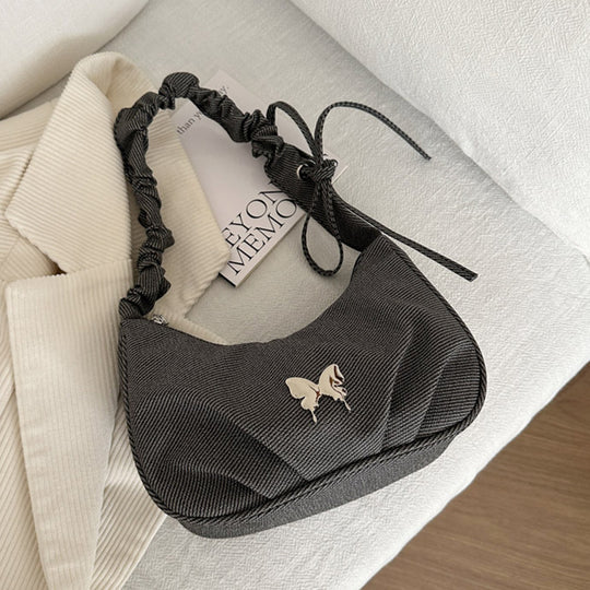 Damen Handtasche mit kreativer Faltentechnik und verspieltem Trageriemen Nord Taschen