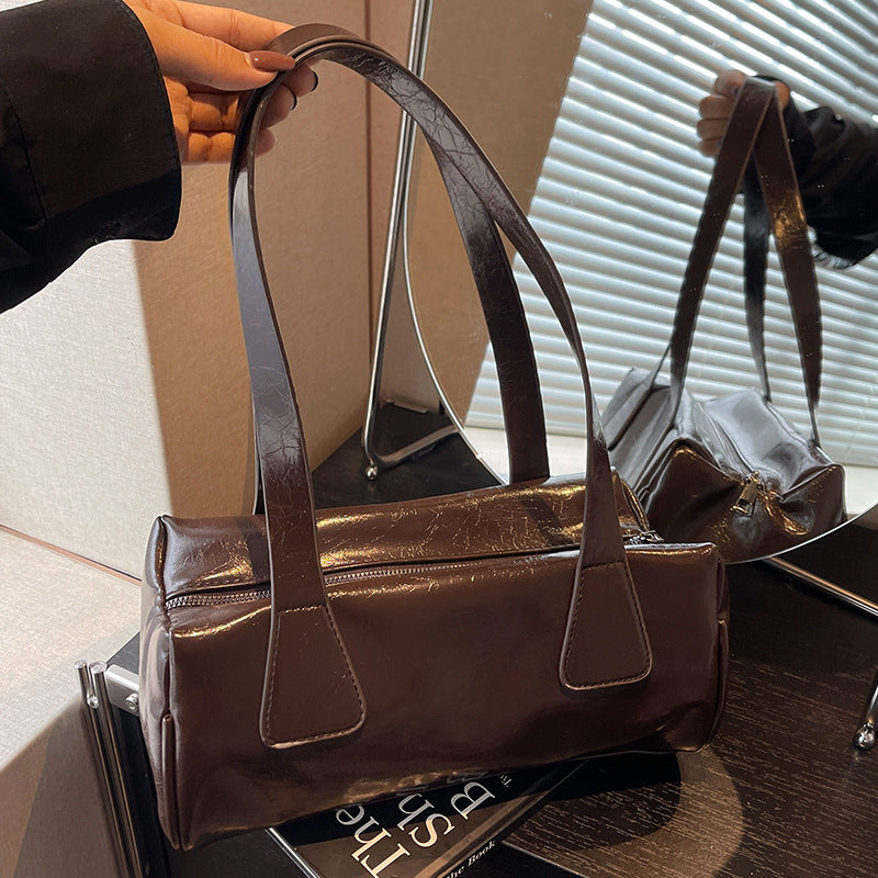 Damen Handtasche mit eleganter glänzender Oberfläche und praktischen Fächern Nord Taschen