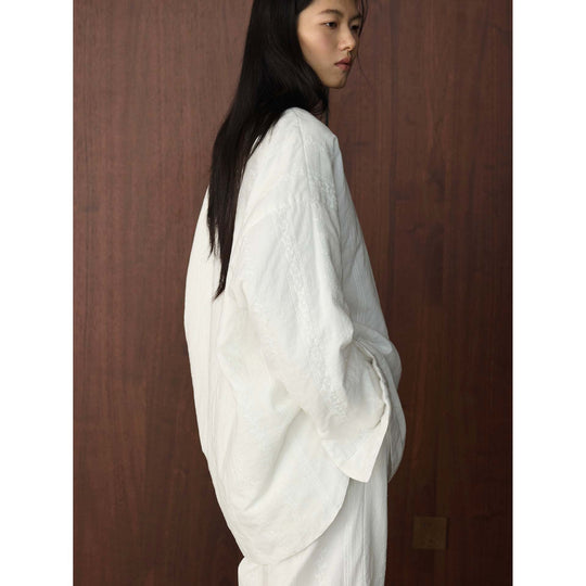 Damen Oversized strukturierte Longbluse mit Rundhals und verlängertem Saum Nord Taschen