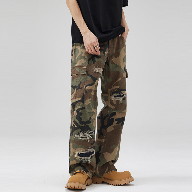 Herren weite Cargo-Hose im Camouflage-Look mit bewusst aufgerissenen Details und großen Pattentaschen Nord Taschen
