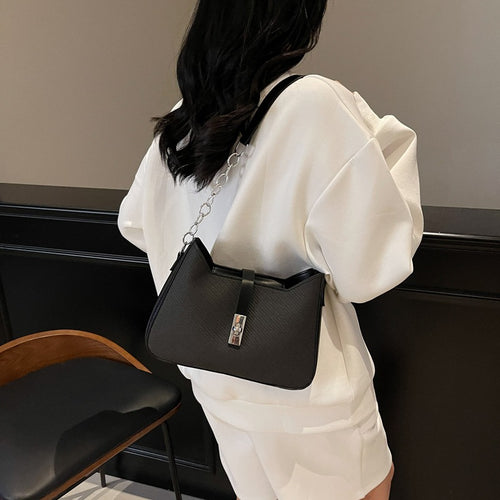 Damen stylische Umhängetasche mit geprägtem Design und dekorativer Kettenverzierung Nord Taschen