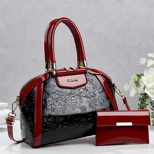 Damen modische Handtasche mit floralen Prägungen und Glanz-Akzenten Nord Taschen