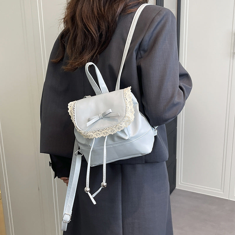 Damen Rucksackhandtasche mit romantischem Spitzenaufsatz und niedlichem Schleifenakzent Nord Taschen