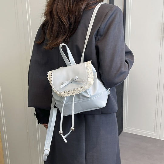 Damen Rucksackhandtasche mit romantischem Spitzenaufsatz und niedlichem Schleifenakzent Nord Taschen