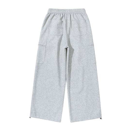 Damen Weite Cropped-Sweathose mit Tunnelzug, Cargo-Taschen und Reißverschluss-Details Nord Taschen