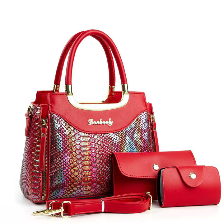 Damen stilvolle Handtasche mit Schlangenleder-Optik und abnehmbaren Accessoires Nord Taschen
