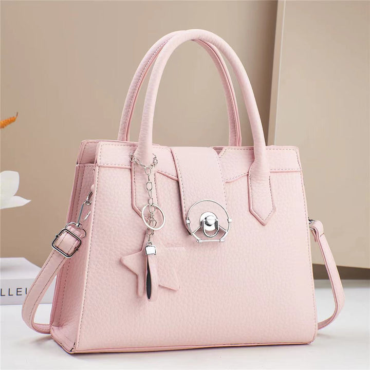 Damen elegante Handtasche mit modischem Anhänger Nord Taschen