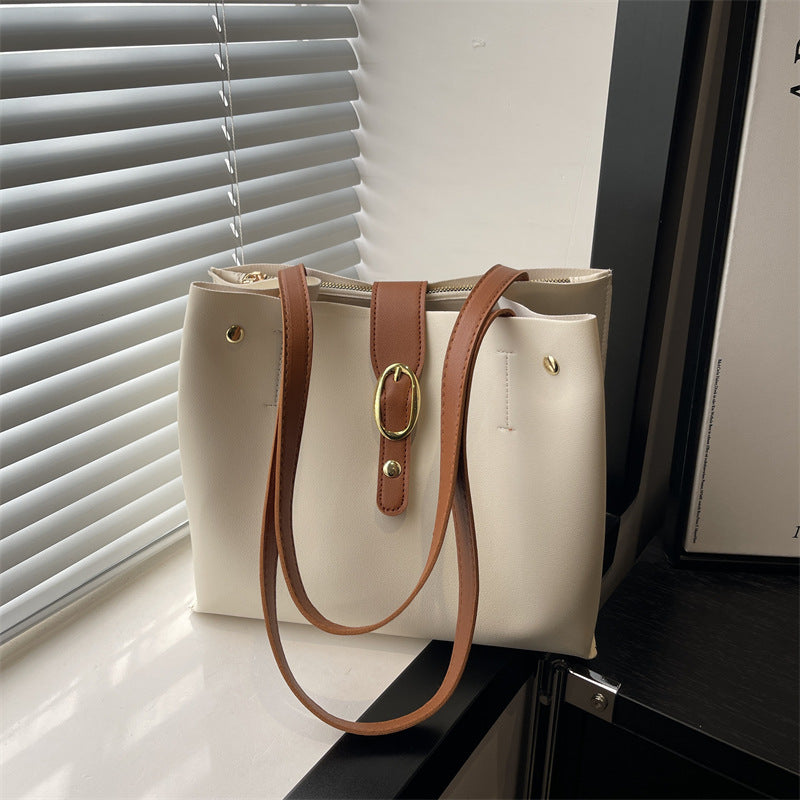 Damen elegante Handtasche mit goldenen Akzenten Nord Taschen
