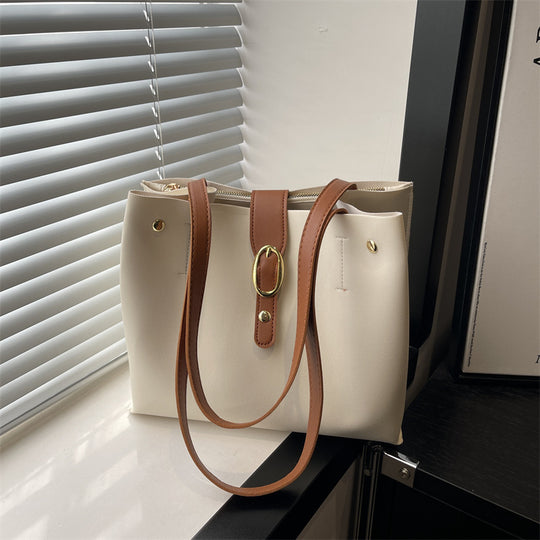Damen elegante Handtasche mit goldenen Akzenten Nord Taschen