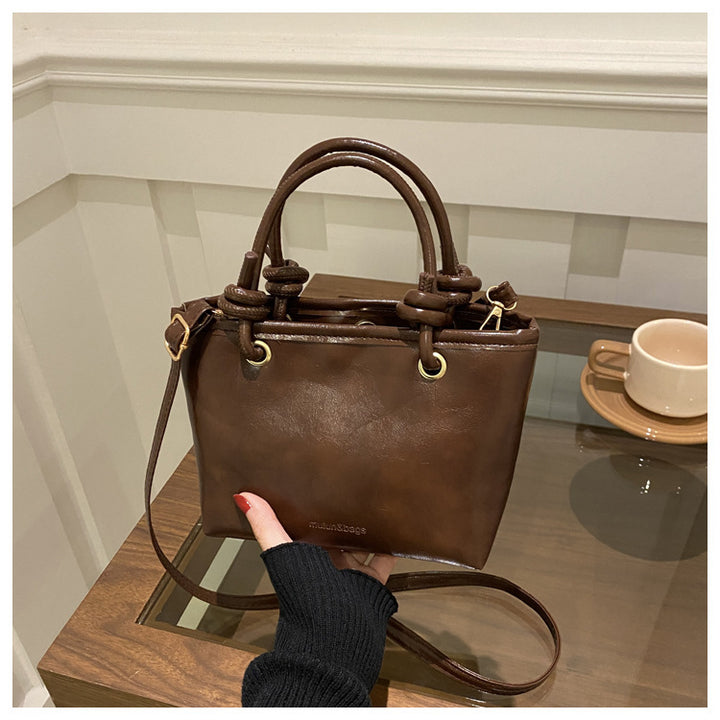 Damen Handtasche mit geflochtenem Tragegriff Nord Taschen