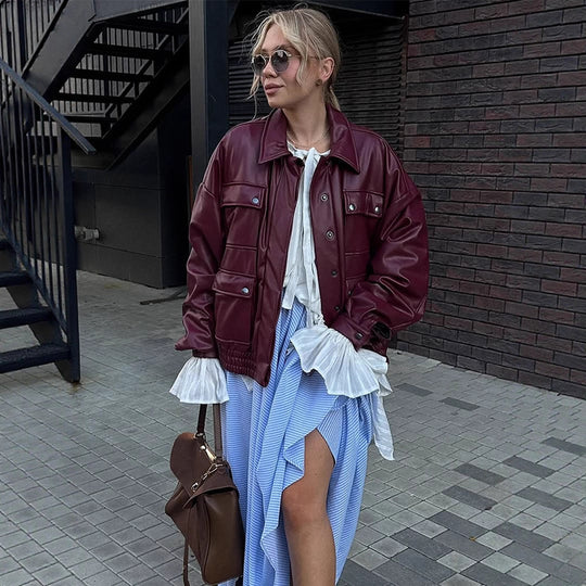 Damen Oversize Kunstlederjacke mit aufgesetzten Druckknopf-Taschen und elastischem Saum Nord Taschen