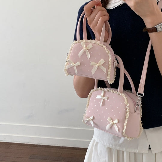 Damen modische Handtasche im verspielt romantischen Design mit Schleifenakzenten Nord Taschen
