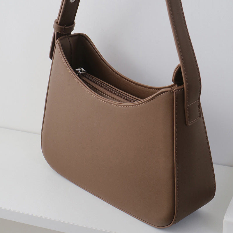 Damen Hobo-Tasche aus strapazierfähigem Kunstleder mit elegantem geschwungenem Design Nord Taschen