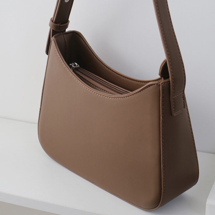Damen Hobo-Tasche aus strapazierfähigem Kunstleder mit elegantem geschwungenem Design Nord Taschen