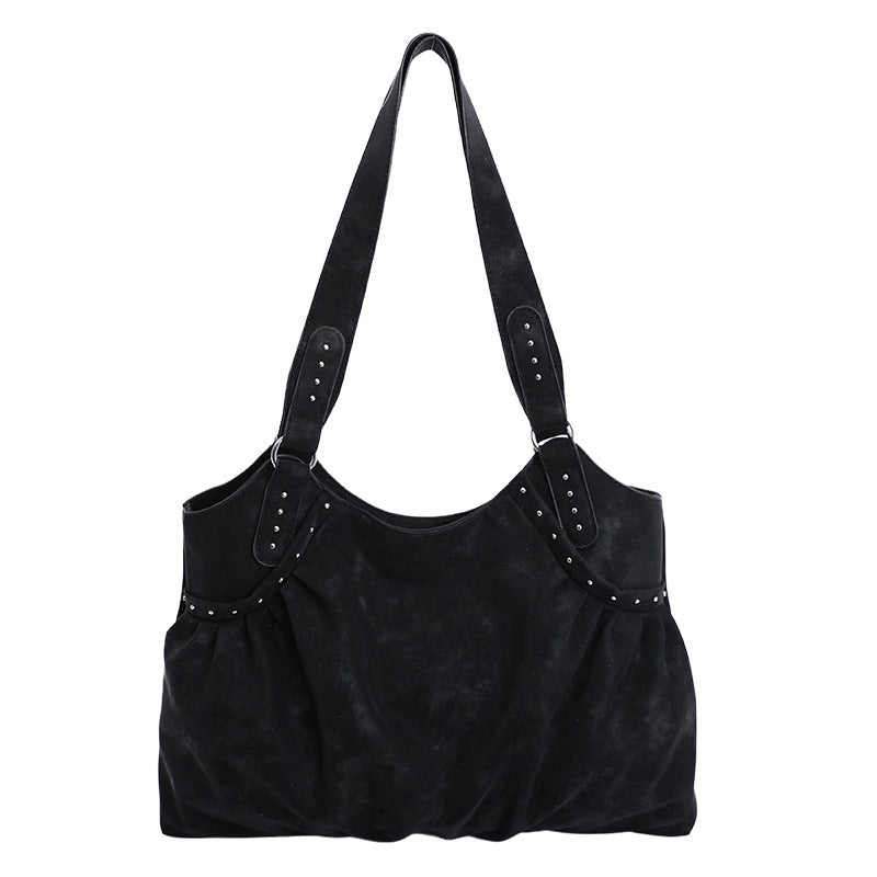 Damen Tasche mit raffiniertem Rüschendesign und Akzenten aus Metall von Nord Taschen