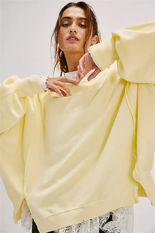 Damen oversized Sweatshirt mit Ballonärmeln, offenen Saumnähten und seitlichen Schlitzen Vittorelli