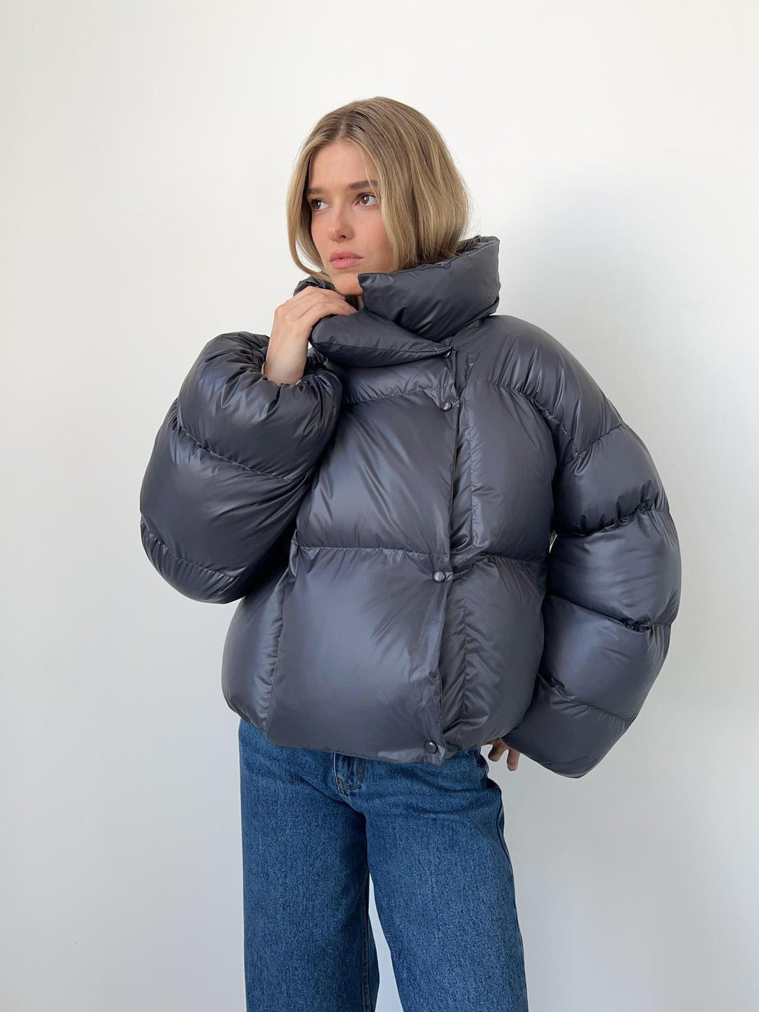 Damen extravagante Oversize Steppdaunenjacke mit extravoluminöser Kapuze Nord Taschen