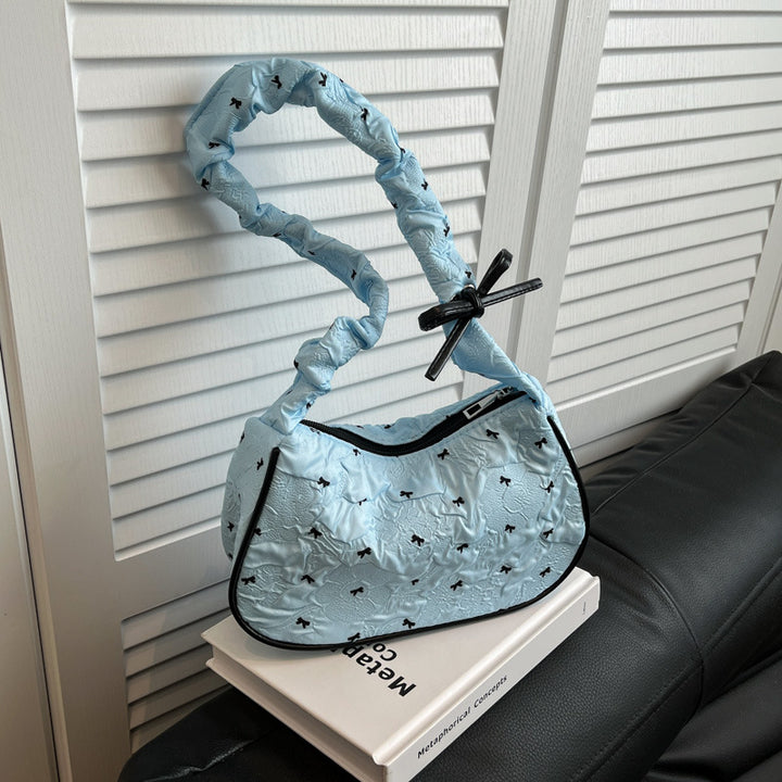 Damen Umhängetasche mit innovativer Schulterriemenstruktur und floralem Design Nord Taschen