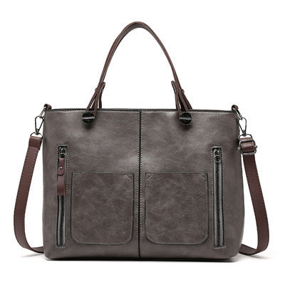 Damen modische Handtasche mit strukturiertem Kunstleder und praktischen Außentaschen Nord Taschen