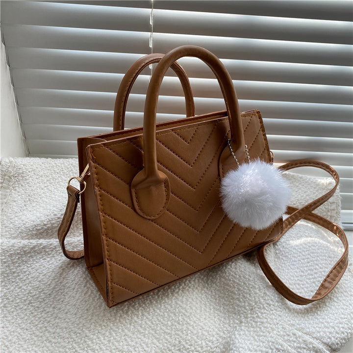 Damen elegante Handtasche im strukturierten Chevron-Design Nord Taschen