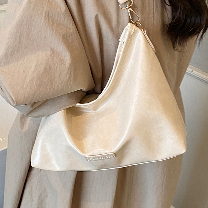 Damen Hobo-Tasche mit elegantem Design und dekorativem Quastenanhänger Nord Taschen