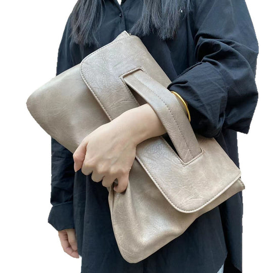 Damen Clutch-Tasche mit elegantem Faltendesign und verstellbarem Trageriemen Nord Taschen
