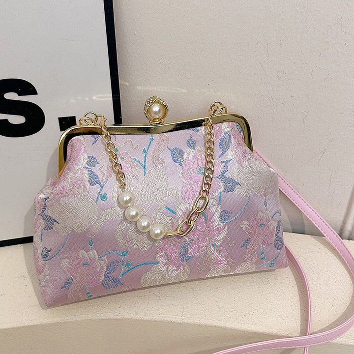 Damen elegante Clutch-Tasche mit floralem Motiv und exklusiver Kettenverzierung Nord Taschen