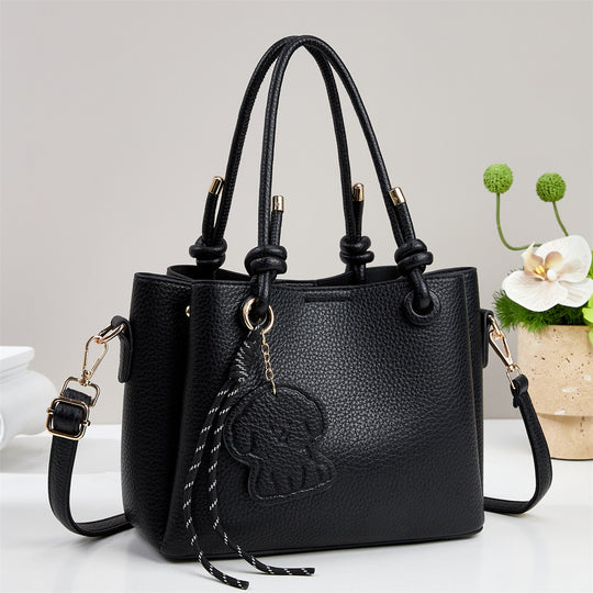 Damen Handtasche mit eleganten Details und abnehmbarer Quastenanhänger Nord Taschen